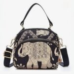 Traditional elephant motif crossbody bag for women in black.