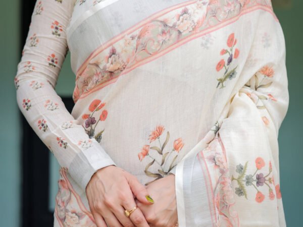 Ivory Pure Cotton Linen Saree with Pastel Floral Design, Blouse, and Tassel Detailing | Crown Fashion