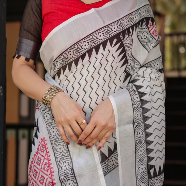 Black and White Geometric Pattern Pure Cotton Linen Saree with Red Accents, Blouse, and Tassel Details | Crown Fashion