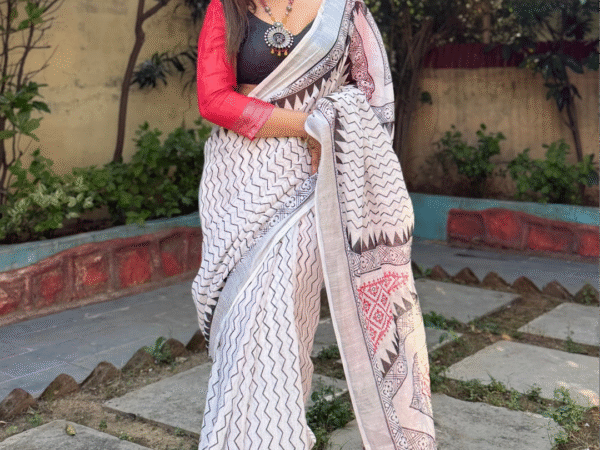 Elegant White Pure Linen Digital Printed Saree with Chevron Design and Intricate Red-Black Geometric Pallu – Tassel Details and Matching Blouse Piece | Crown Fashion