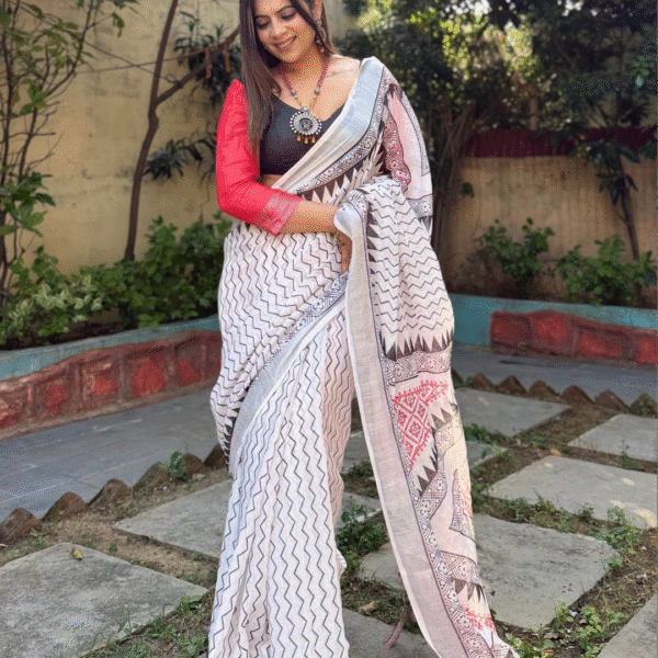 Elegant White Pure Linen Digital Printed Saree with Chevron Design and Intricate Red-Black Geometric Pallu – Tassel Details and Matching Blouse Piece | Crown Fashion