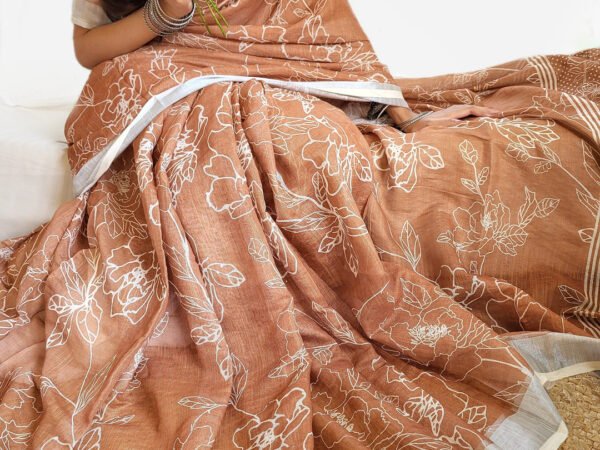 Rust Brown Pure Linen Saree with White Floral Motifs and Tassel Detailing | Crown Fashion