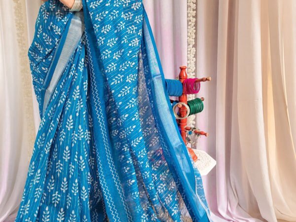 Elegant Blue Pure Linen Saree with Tassels and White Floral Patterns | Crown Fashion