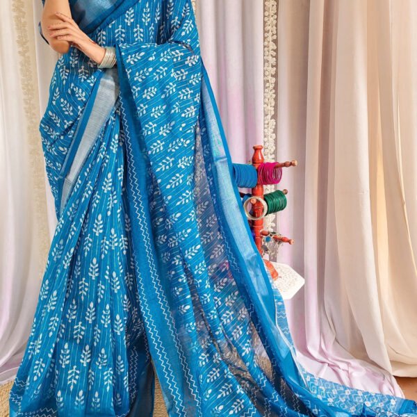 Elegant Blue Pure Linen Saree with Tassels and White Floral Patterns | Crown Fashion