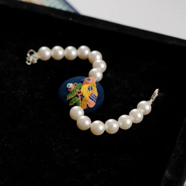 Embroidered Parsi Gara Blue Bird Pearl Bracelet | HOUSE OF HERITAGE