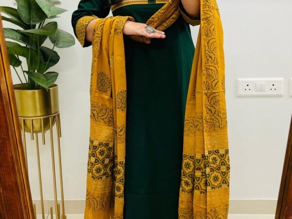 Women's Emerald Green Cotton Kurta Set with Intricate Ajrakh Yoke and Mustard Floral Dupatta | Komal Collection