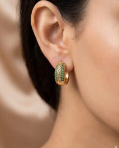 Emerald Grace Hoops featuring elegant green stones with luxurious gold hoop design for women