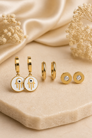 Aira Luxe Earrings Set featuring elegant gold statement earrings with a modern and chic design.