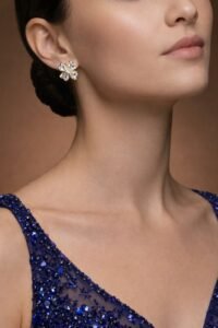 Golden Clover Spark Studs with elegant gold clover sparkle design for women