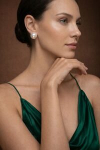 Luna Pearl Dome Studs with elegant pearl detailing and stylish dome design.
