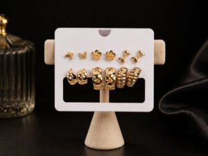 Golden Flutter Multi-Stud & Mini Hoop Earring Set with elegant gold butterfly studs and mini hoop earrings for women