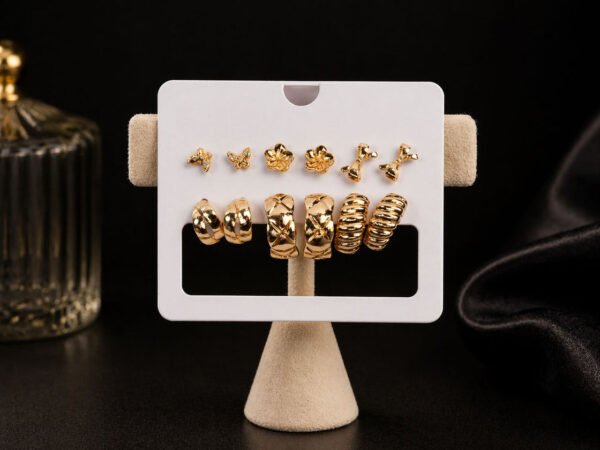 Golden Flutter Multi-Stud & Mini Hoop Earring Set with elegant gold butterfly studs and mini hoop earrings for women