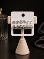 Golden Flutter Multi-Stud & Mini Hoop Earring Set with elegant gold butterfly studs and mini hoop earrings for women