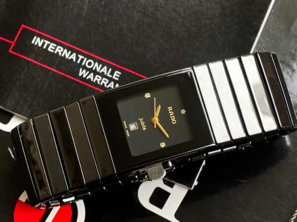 RADO Jubile Black Ceramic Rectangular Quartz Analog Watch for Men | Premium Black Dial, Gold Hands, Date Display
